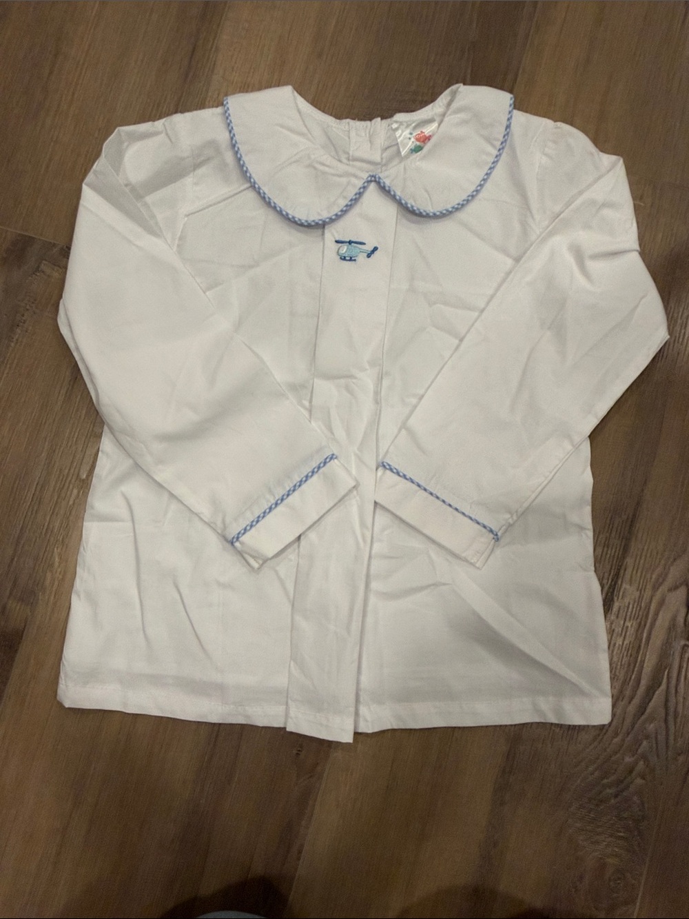 White Peter Pan Collar Blouse with Blue Trim and Helicopter Embroidery